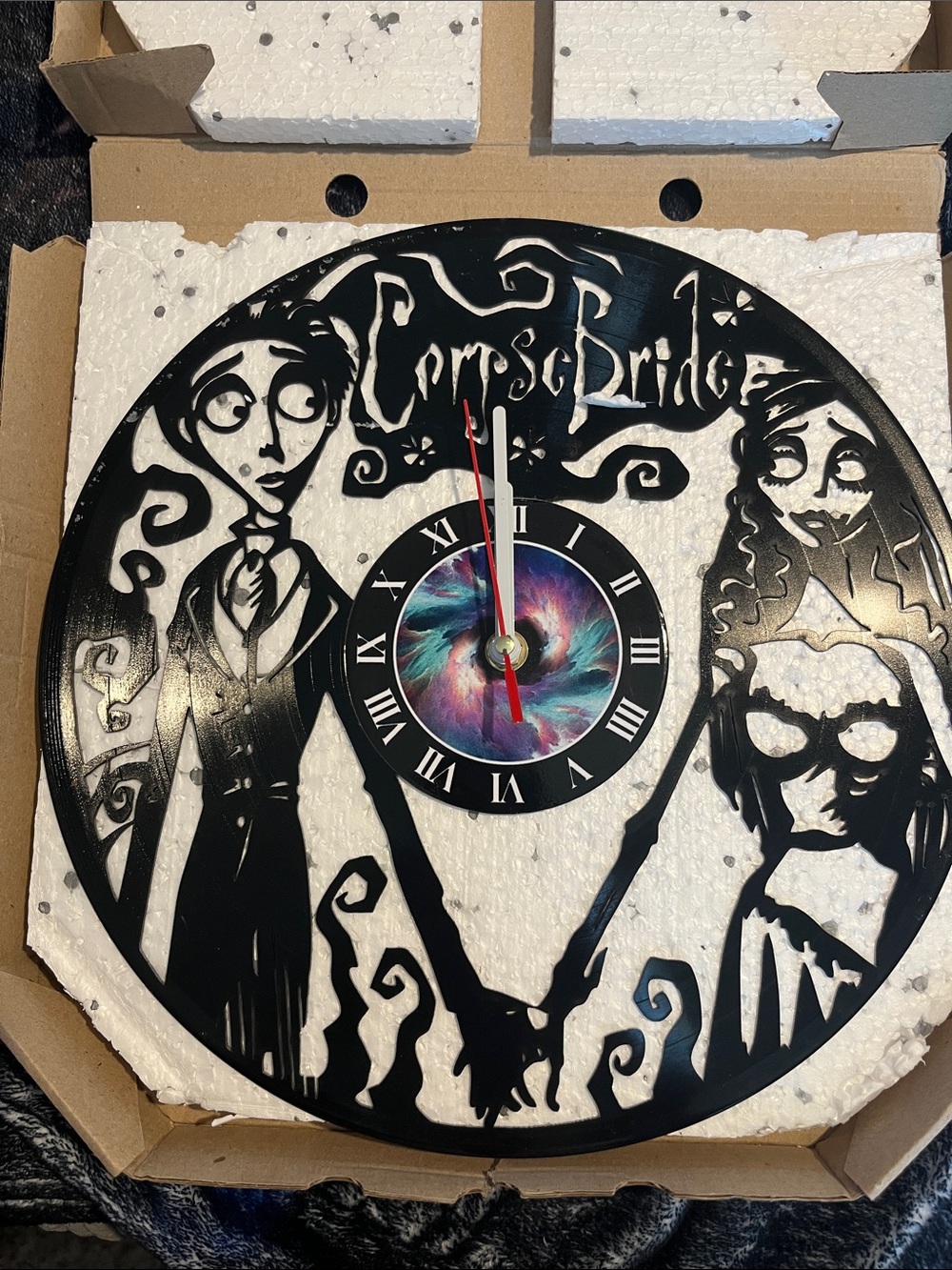 Black Tim Burton Style Wall Clock made from a record with Colorful Dial